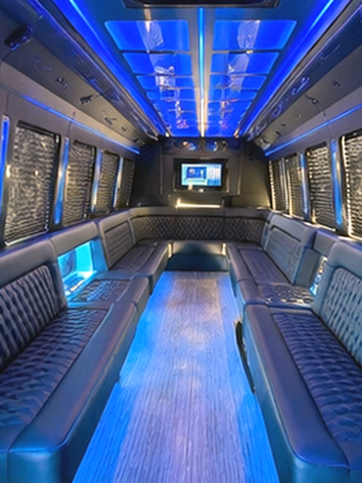 Wedding guests seated inside a party bus serving The Bronx